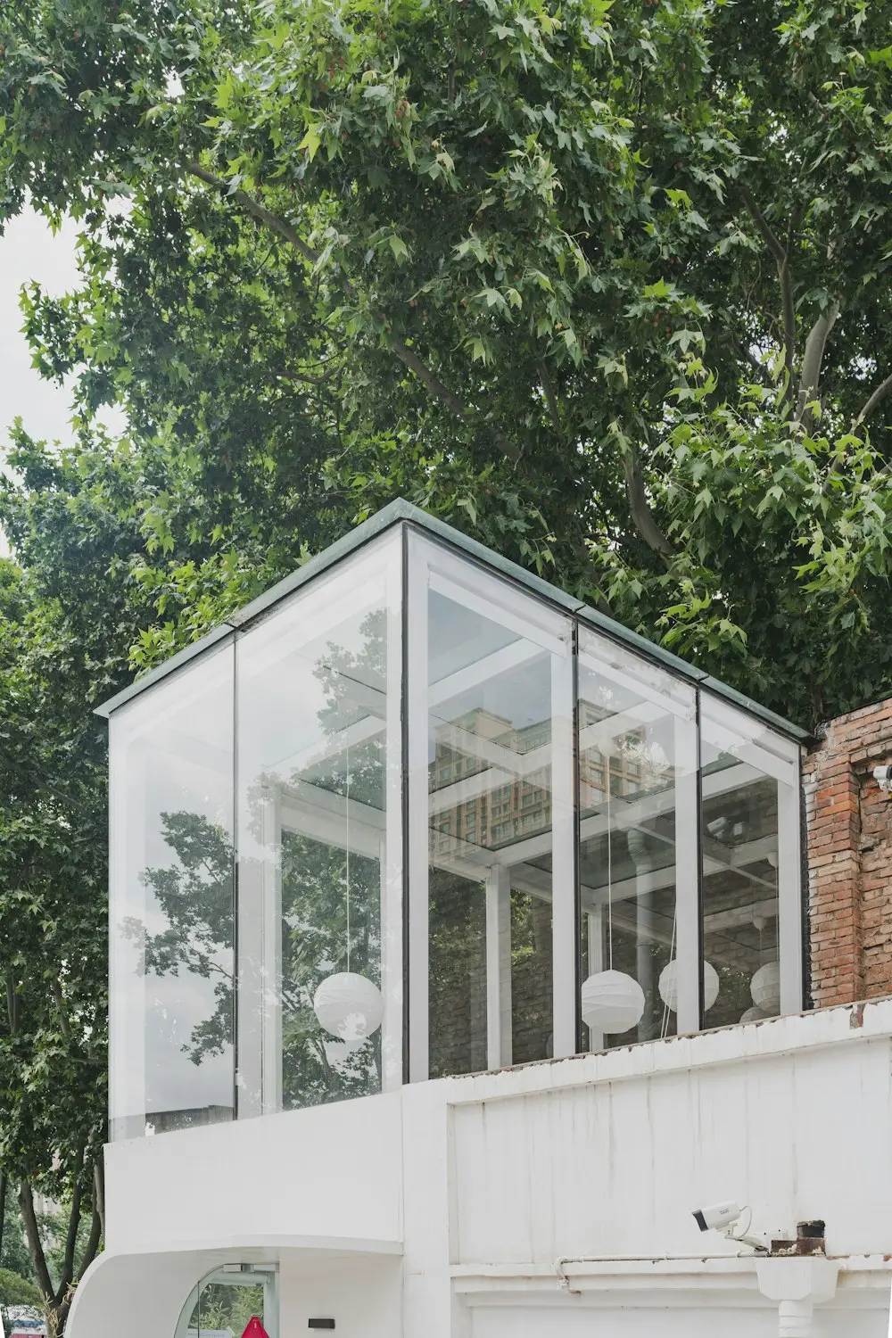 Glazed garden room among trees