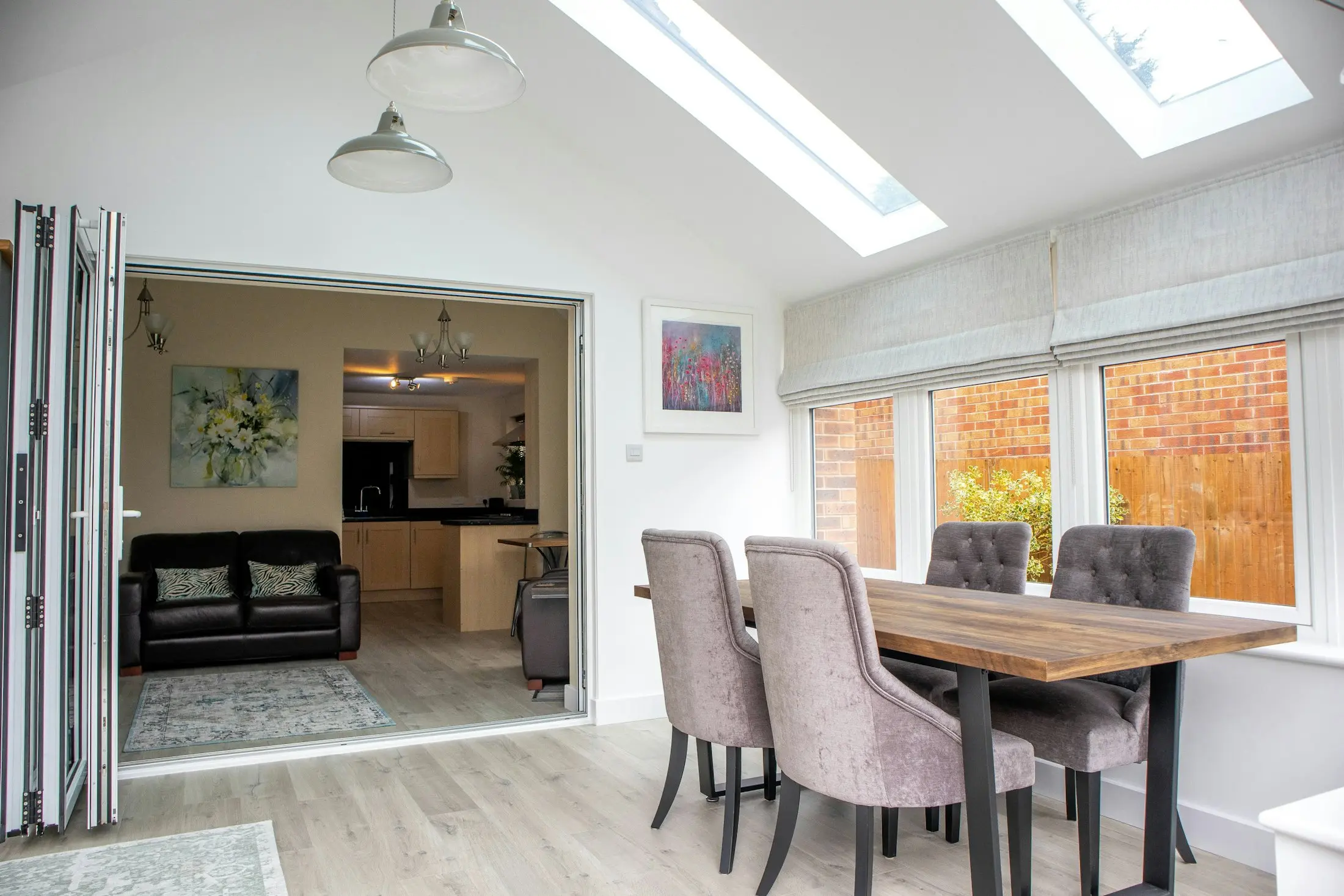 Bright kitchen extension with roof lights and garden doors