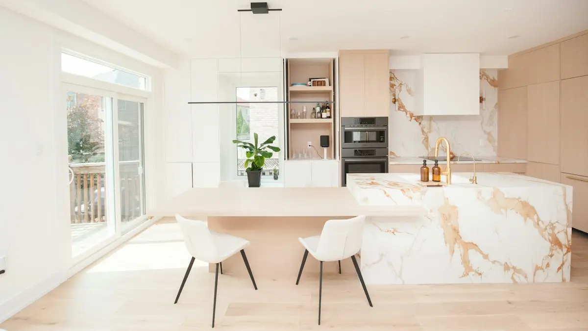 Light open plan kitchen diner with marble worktops