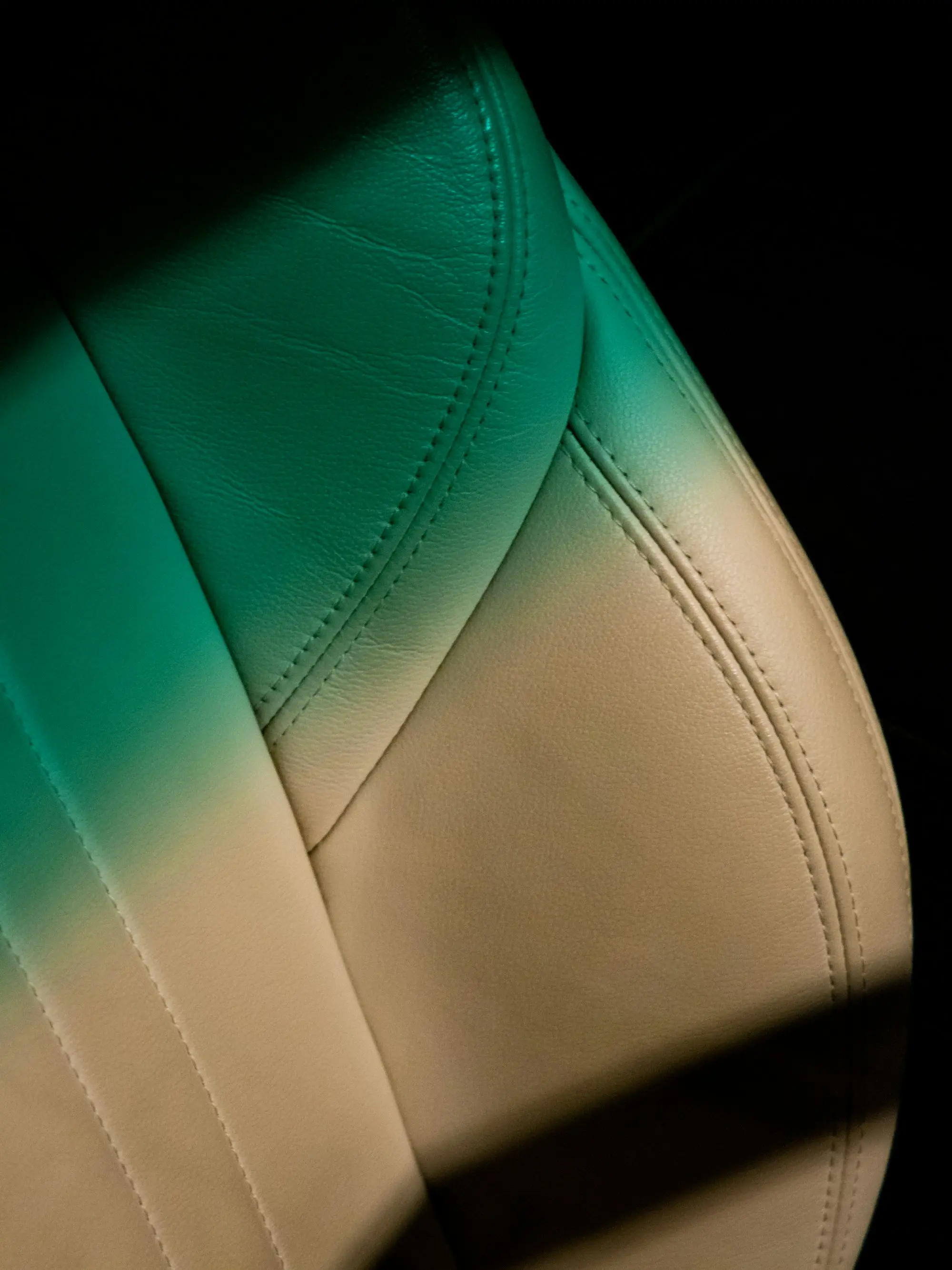 Close up of stitched leather seat