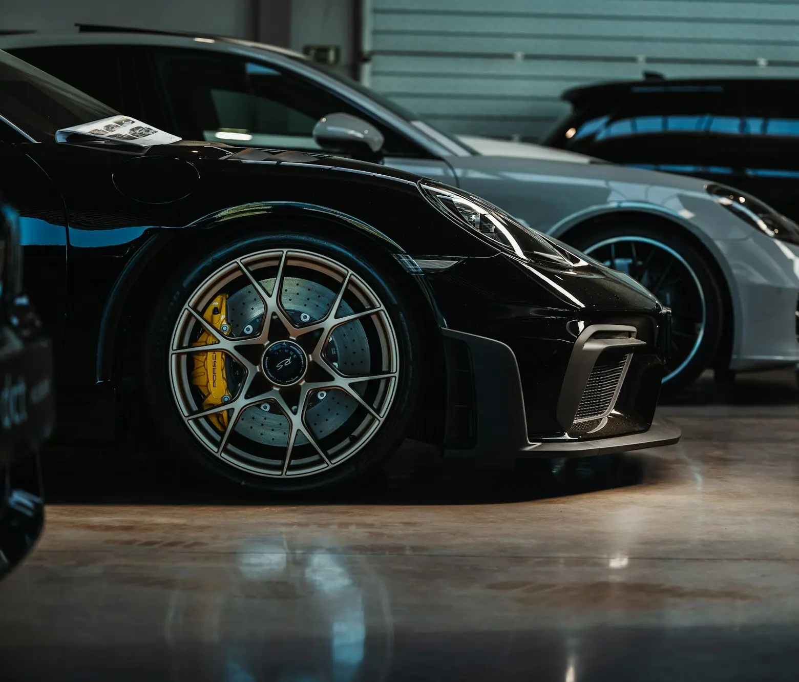 Black track focused coupe with gold wheels