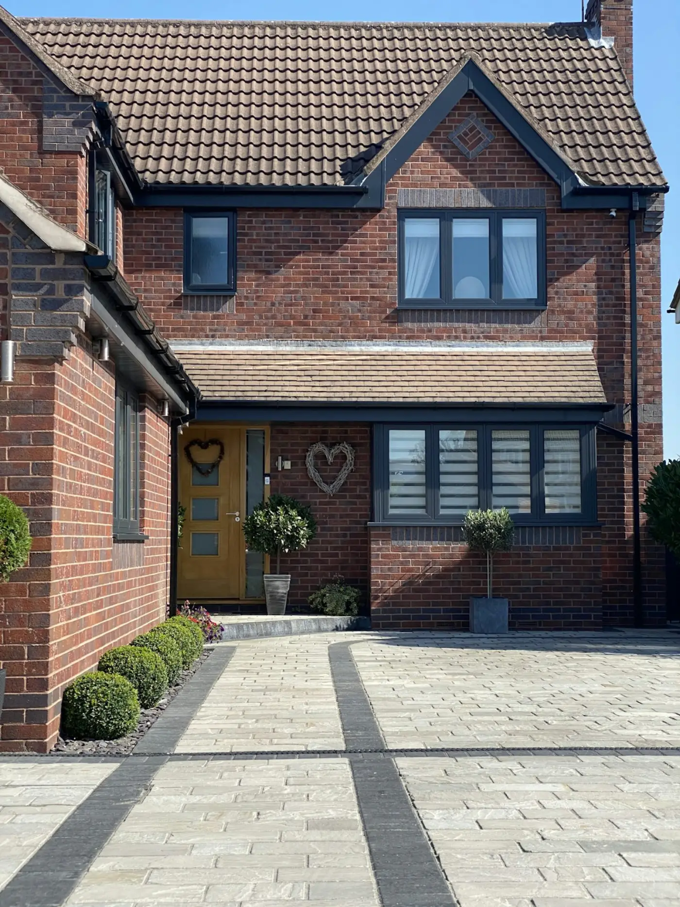 Brick house with a clean front path