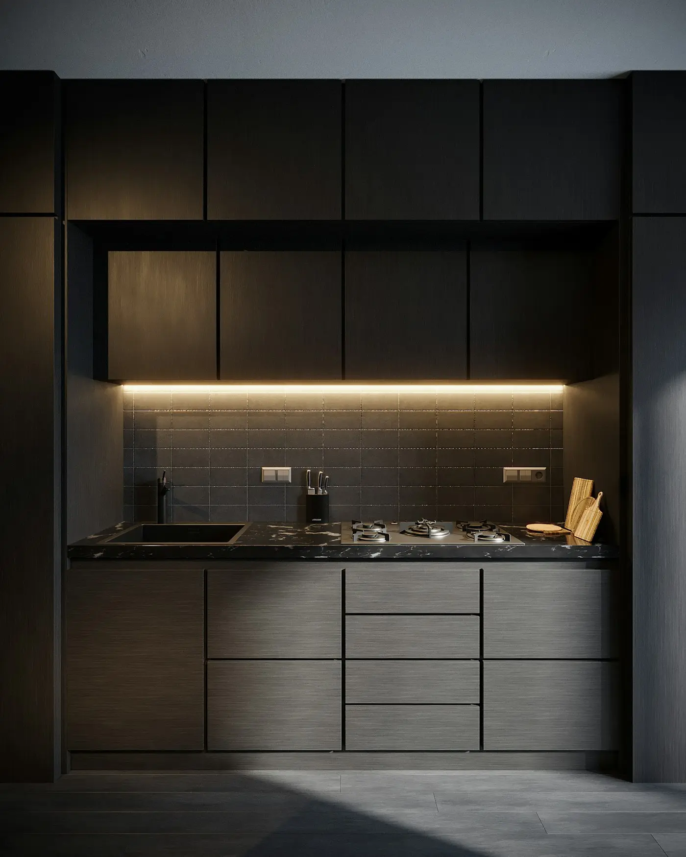 Black kitchen run with warm under cabinet light